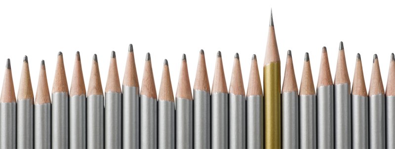 A row of identical blunt silver pencils, with one sharp gold coloured pencil standing tall in the row - distinctive, standing out from the crowd