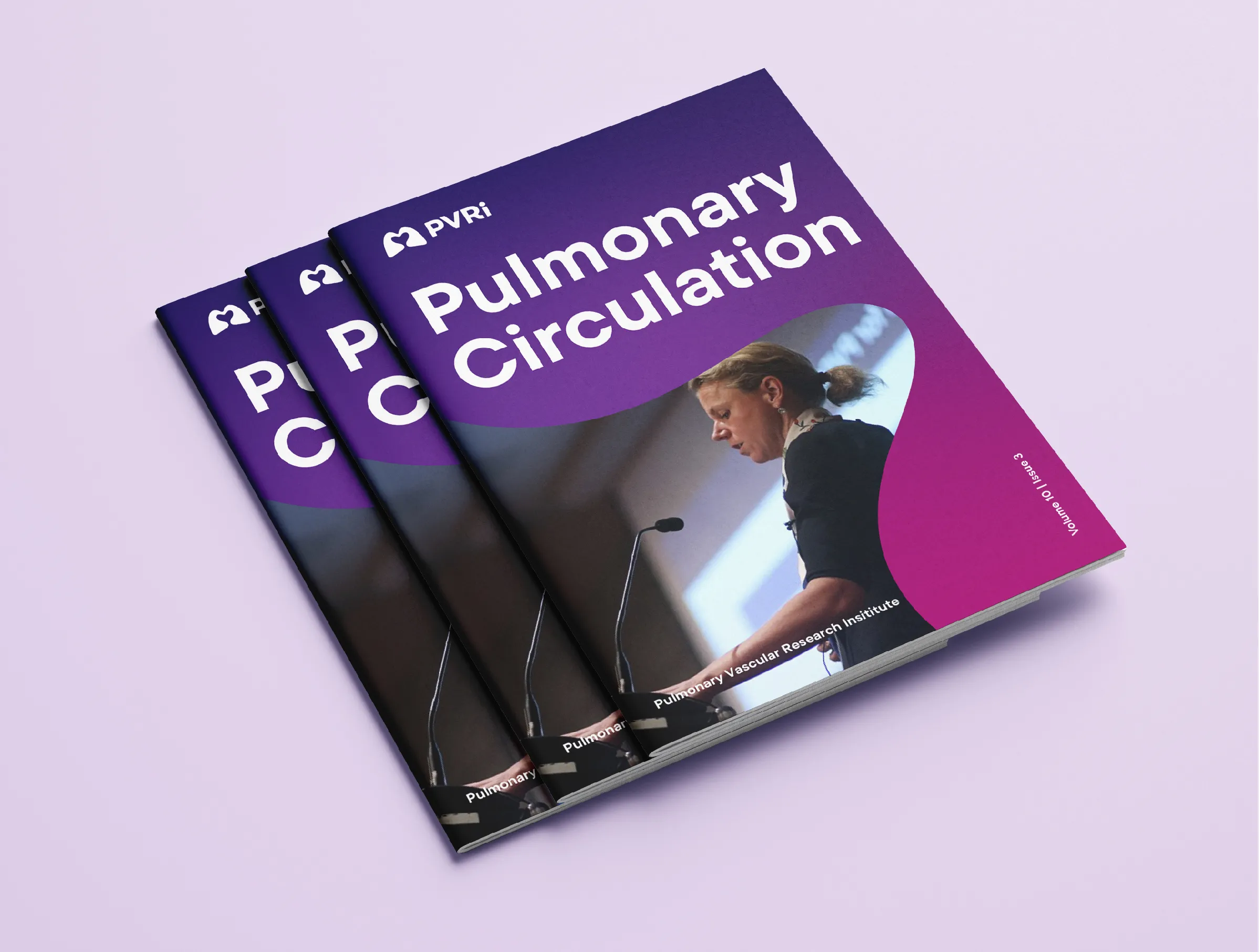 Stack of PVRI's Pulmonary Circulation publications in the new branding