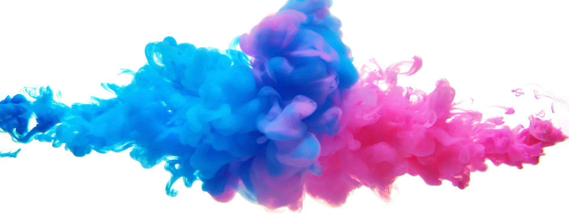 Multicolor liquid impact - blue and pink merge into a purple blend